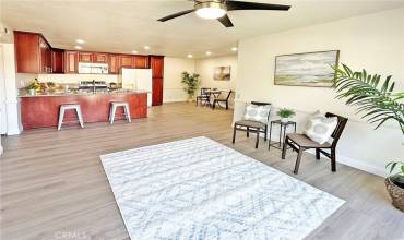 Open concept living room, kitchen, dining