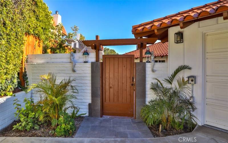 Gated courtyard entrance.