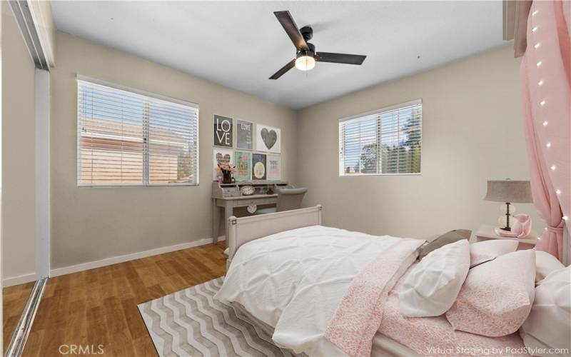 Upstairs bedroom is virtually staged