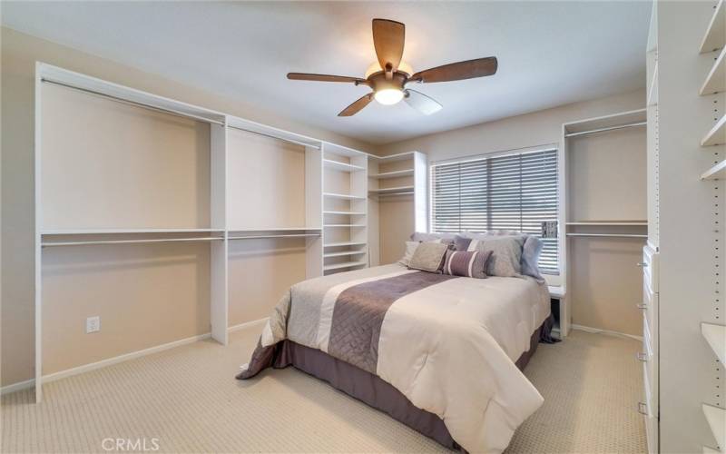 Bedroom 1 with sliding closet and shelves for more storage