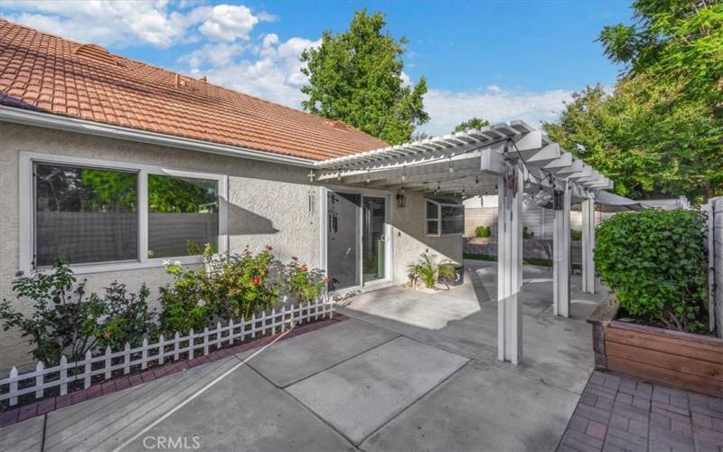 Backyard trellis patio