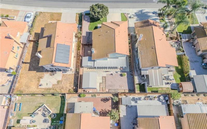 Aerial view of house and backyard.