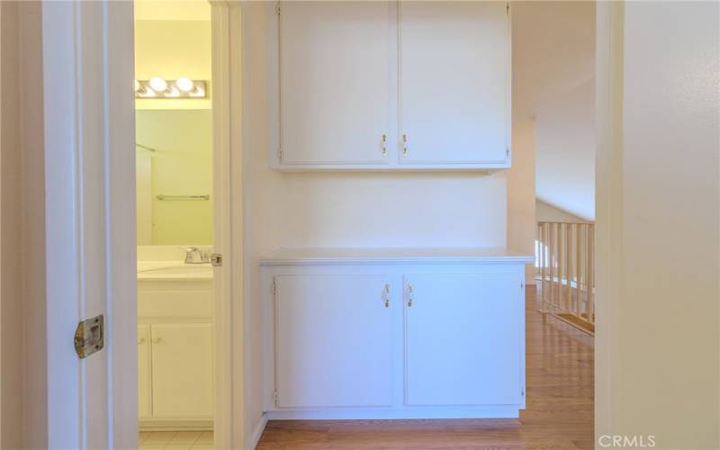 Upstairs hallway cabinets.