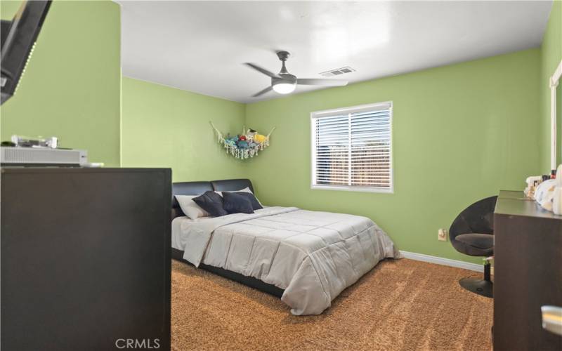 Guest bedroom - with rear yard views.