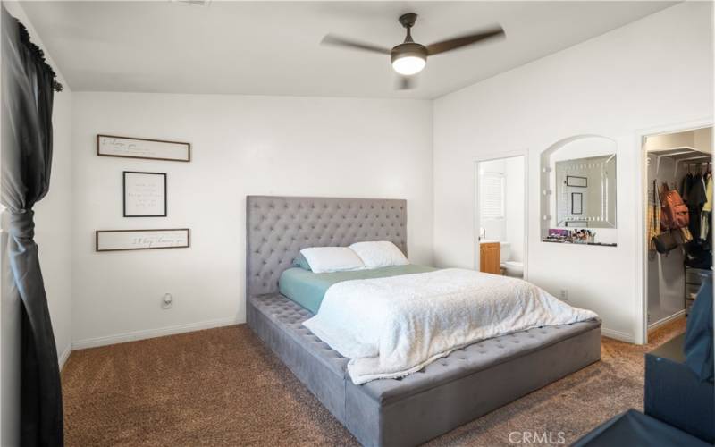 Primary bedroom w/north window to bring in the light, walk in close,