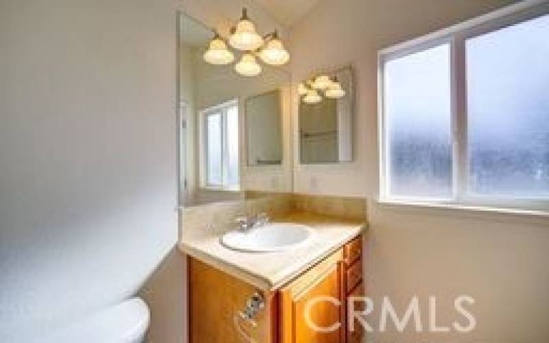 Master Bath with a large oval bath and shower