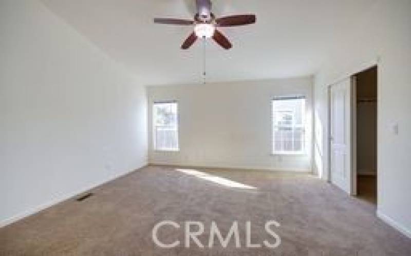  large Master Bedroom with a walk in closet