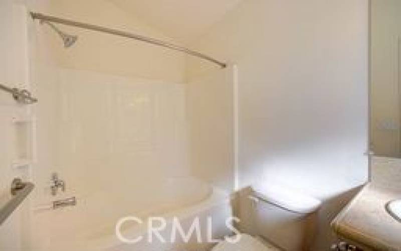 Master Bath with a large oval tub and shower