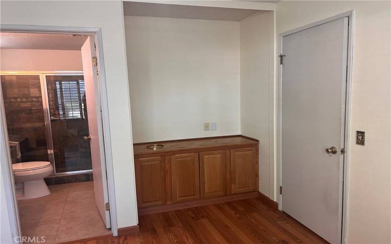 Downstairs bedroom used as an office. May have closet doors.