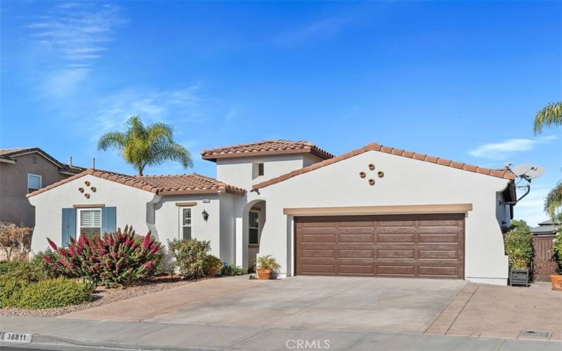 Front with extended driveway