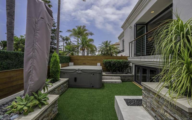 Private yard with hot tub