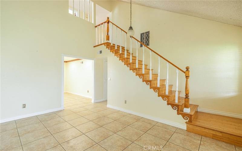 Living room view of the stairs