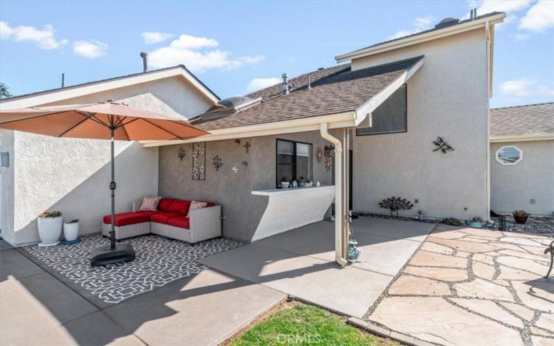 Back patio with pass-through to kitchen area.  Slab originally included a hot tub so electrical is still available.