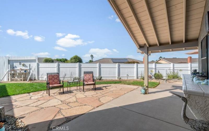 Patio off the the sliding door in the kitchen.  Lots of privacy with no homes looking into the backyard