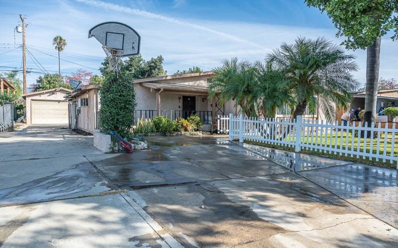 View of duel driveway & 2 car detached garage.