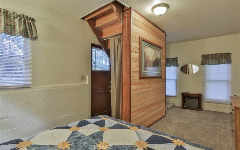 Downstairs Bedroom with door to outside