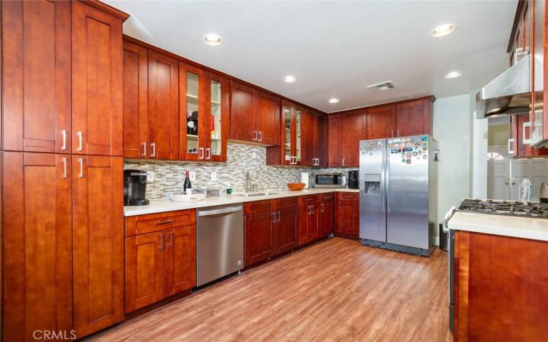 Custom Cabinets, artful back splash and granite countertops