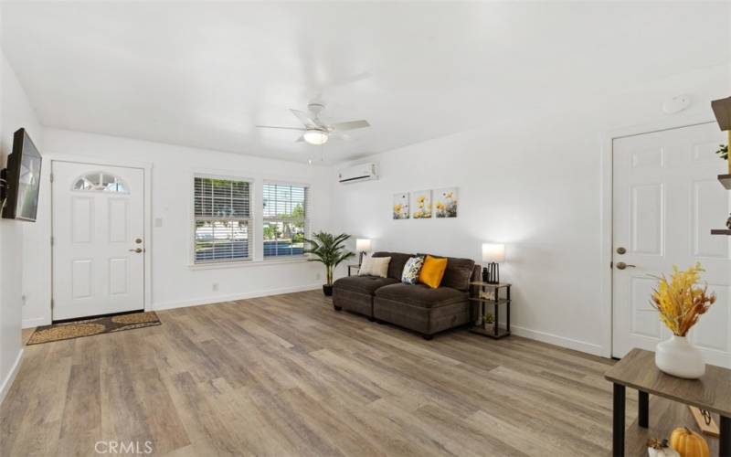 Living room with direct garage access.