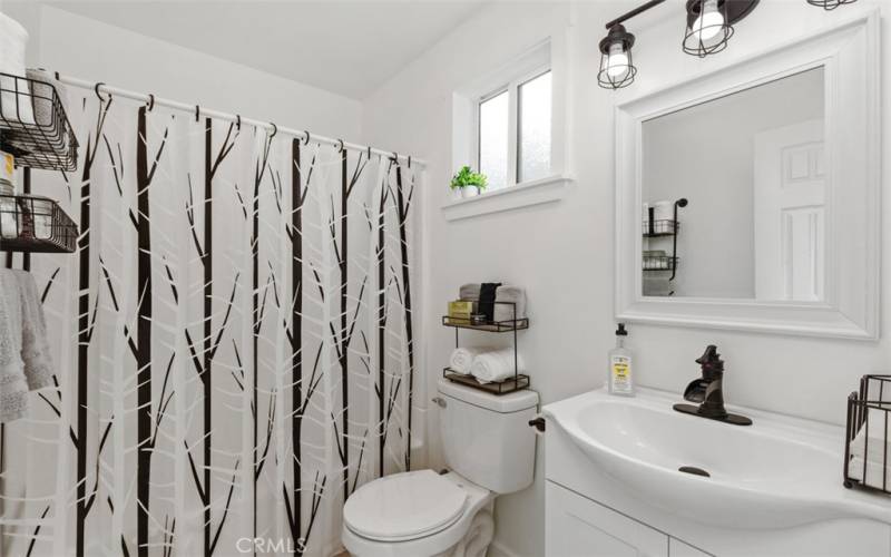 Renovated bathroom off of primary bedroom.