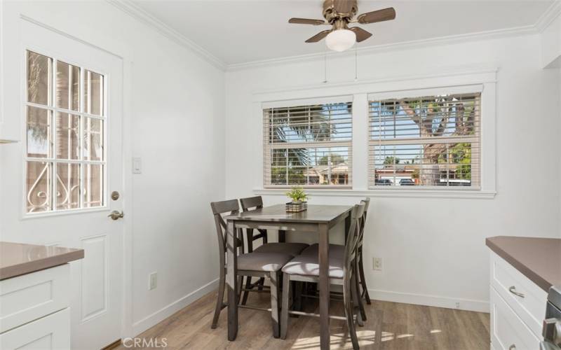 Kitchen with access door to side yard.