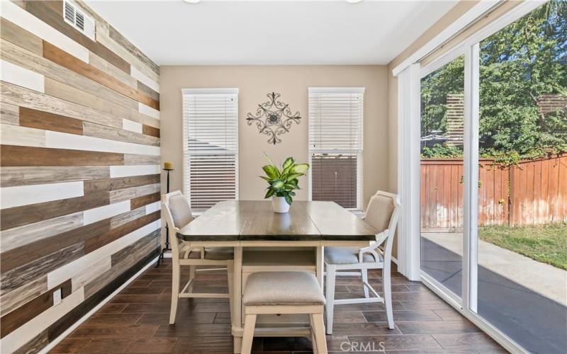 Breakfast nook with sliding doors to backyard