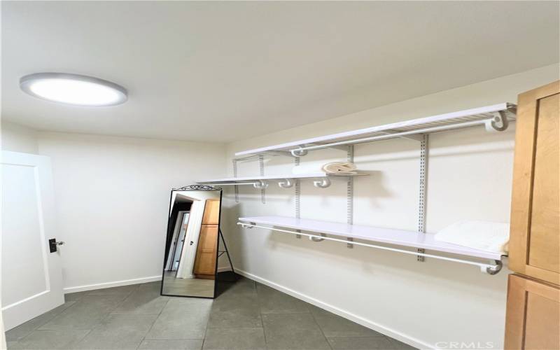 Walk in closet with built in shelving