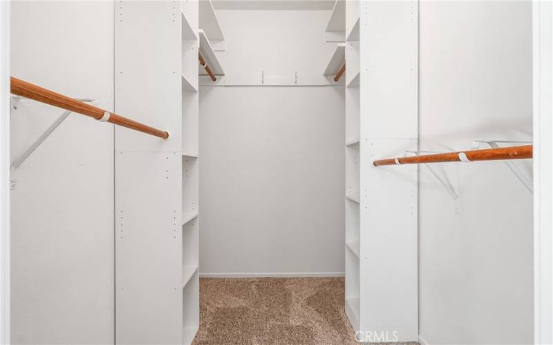 Walk-in closet in primary bedroom