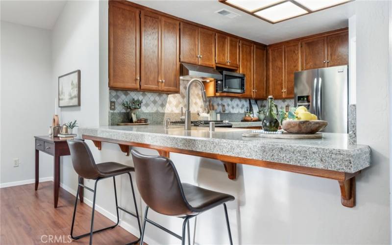 Family room with room for some bar stools for extra eating area. Great for entertaining!