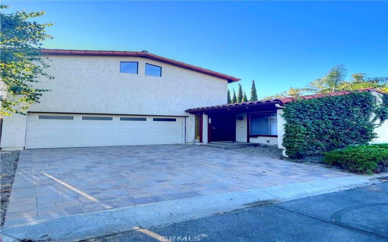 2 car garage with direct access, and driveway.