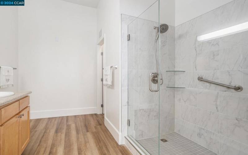 Newer walk in shower and plenty of room for dressing area