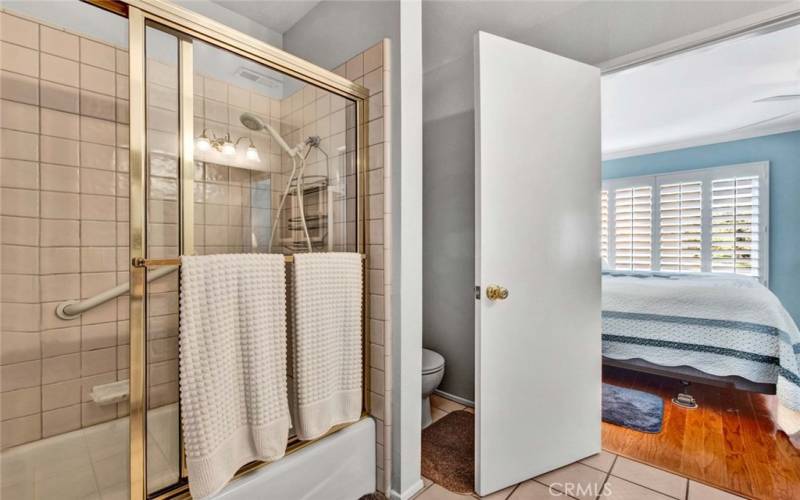 Bathroom from second bedroom with tub/shower combo