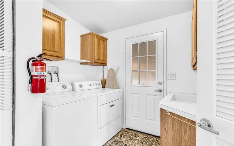 Great indoor laundry room and also offers a large sink for easy handwashing.