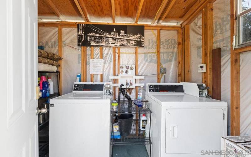 Coin operated laundry room shared by tenants