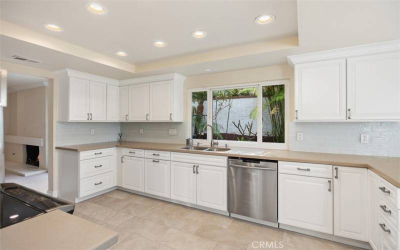 Recently remodeled kitchen with silestone counter tops.