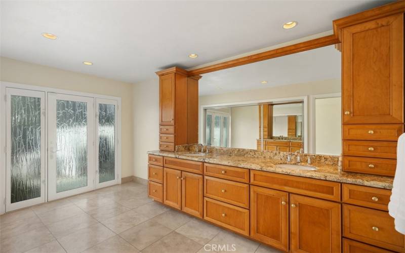 Primary bathroom with a dual vanity area.