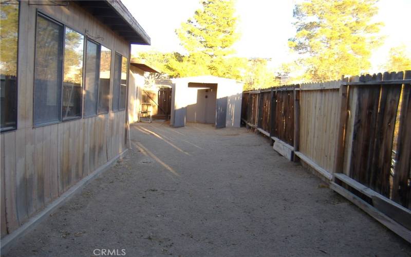 Fenced rear yard with much more room beyond