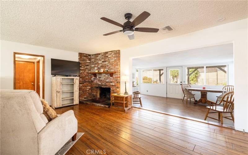 Cozy Brick Fireplace and Open Floor Plan