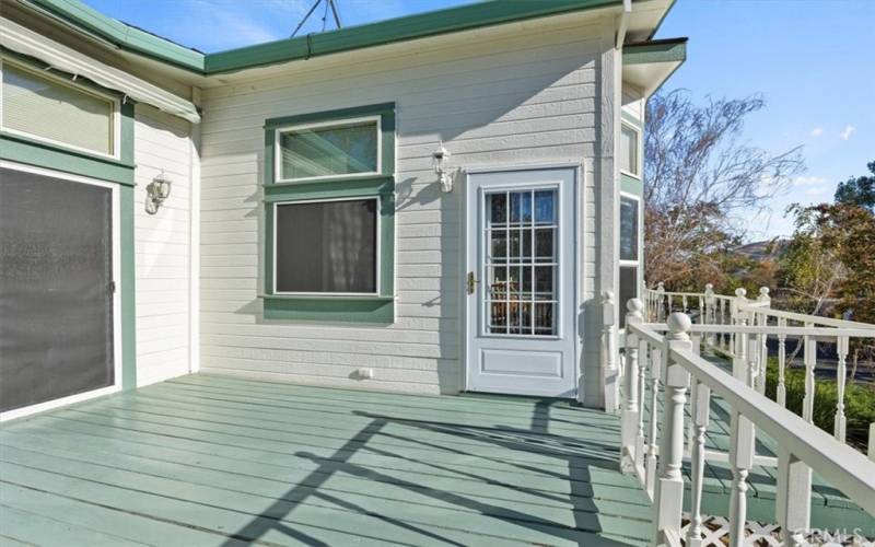 Kitchen and Living room access from this area of the deck. Perfect for BBQ or outdoor meals