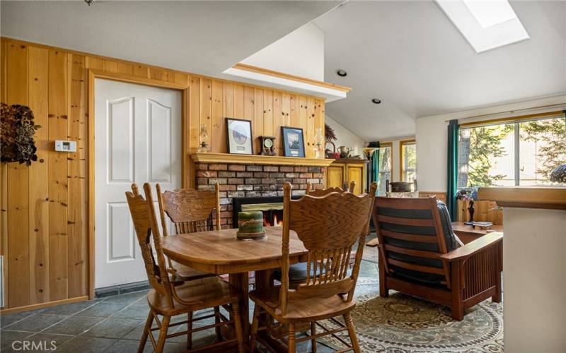 Dining area with laundry room access.