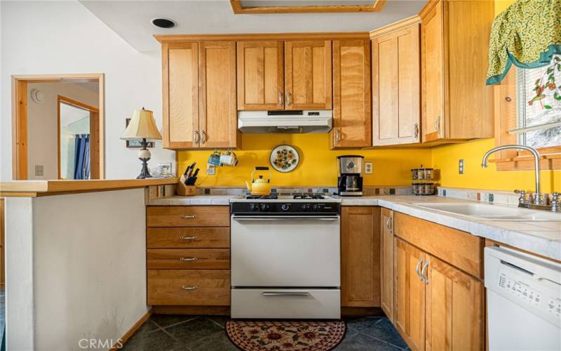 Kitchen with beautiful wood cabinets.