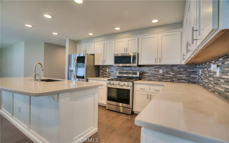 Designer kitchen with stainless appliances