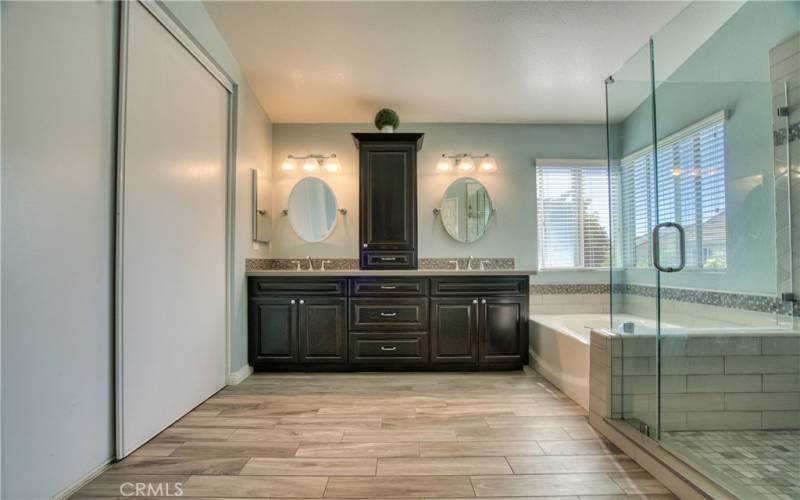 Primary bathroom with tile flooring