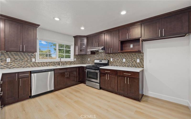 Kitchen has plenty of cabinets with ample storage