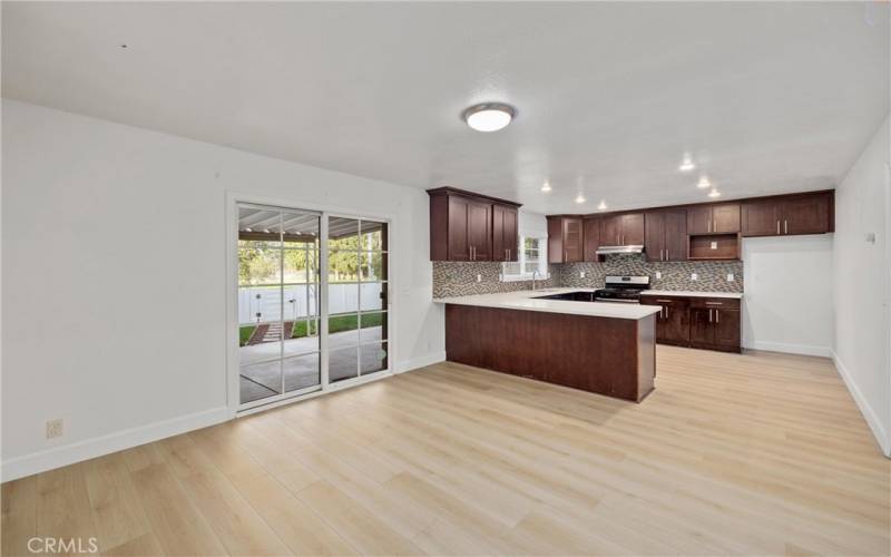 Dining area connected to open kitchen