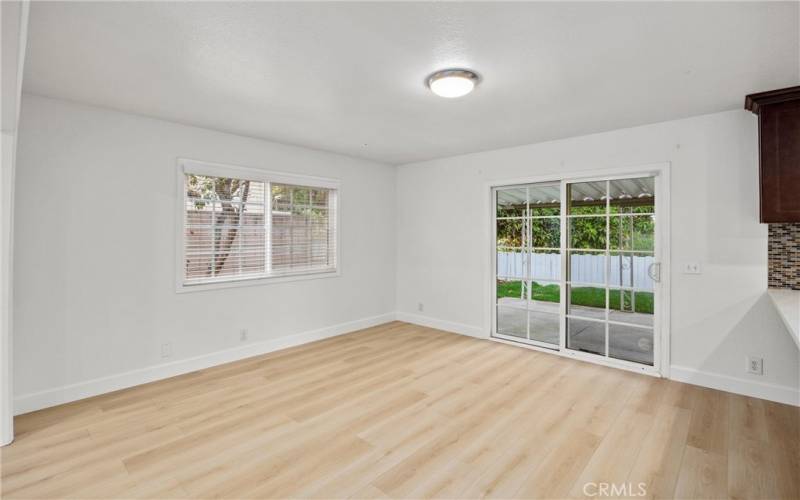 Dining area with slider to backyard patio