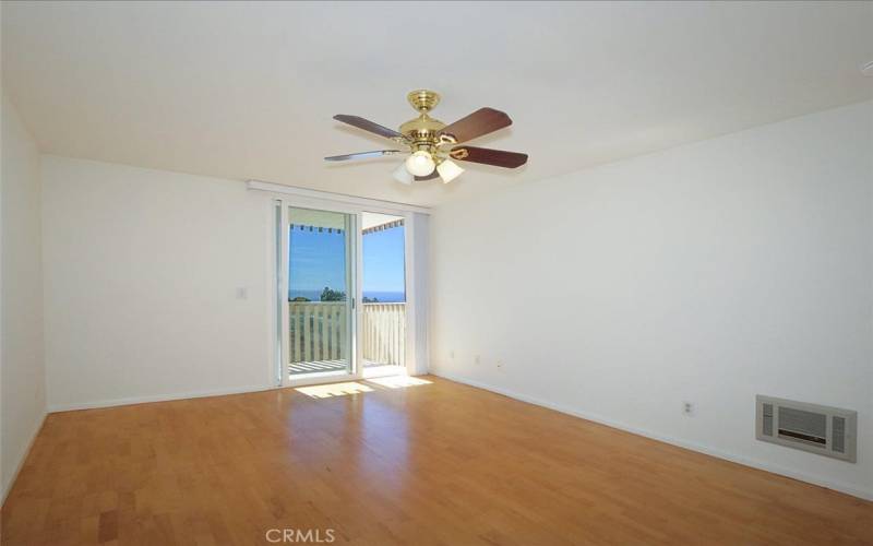 Primary Bedroom with Private Balcony looking out to View