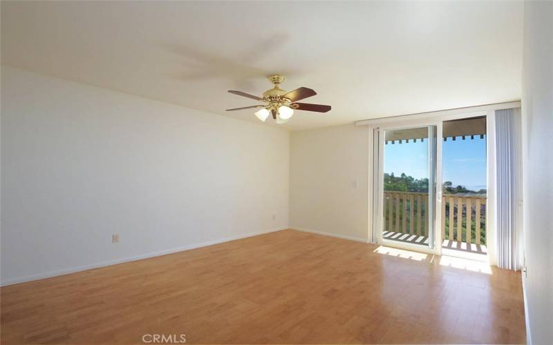 Primary Bedroom with Private Balcony looking out to View