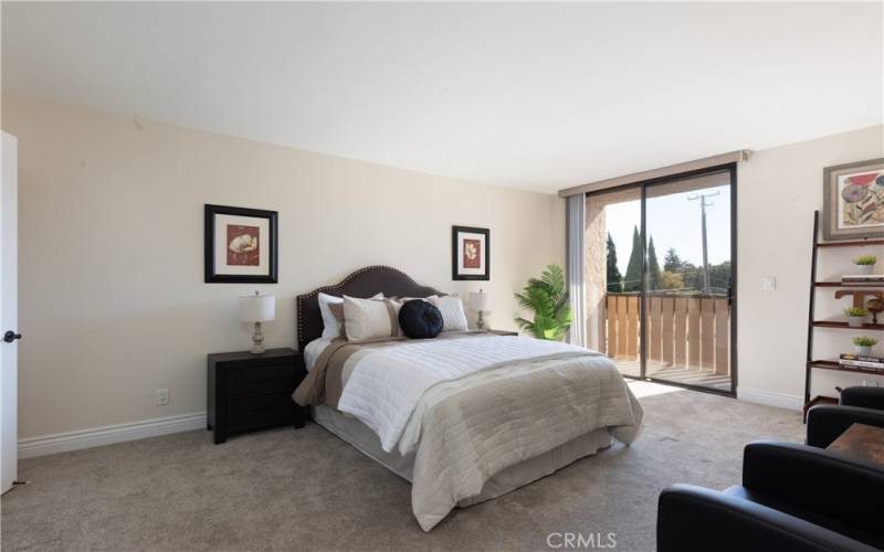 primary bedroom with balcony