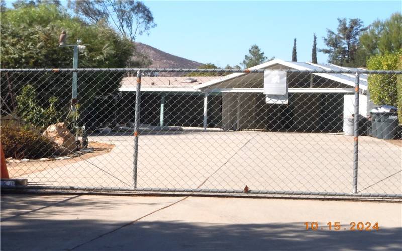 Remote gate entrance & parking for your cars & RV's...more than 100 feet in driveway length.