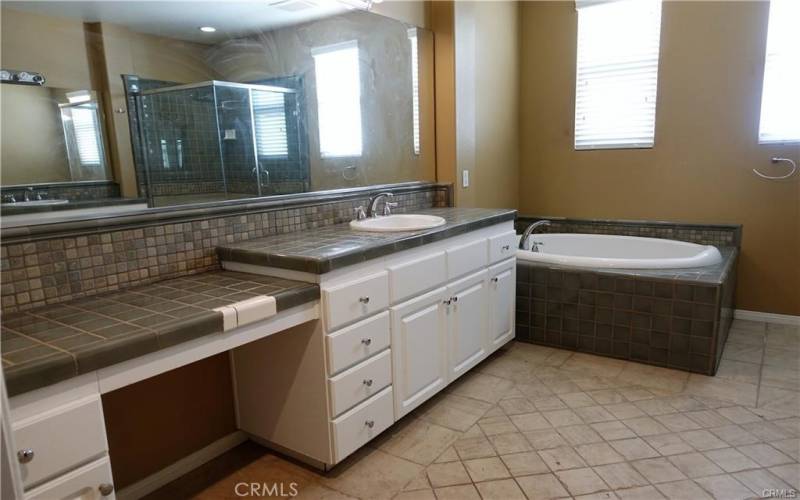 Main bathroom dressing area and sink